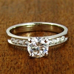 Classic 4-Prong Solitaire with Channel-Set Side Stones