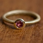Dainty Pink Sapphire Gold Solitaire
