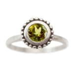 Cosmos Engagement ring with Peridot