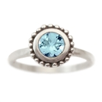 Cosmos Engagement ring with Blue Topaz