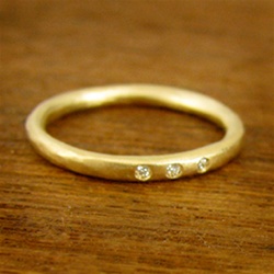 Michele Scholnick's Diamond Wedding Band with 3 Diamonds