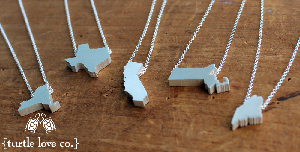 New York Necklace, Texas Necklace, California Necklace, Massachusetts Necklace, and Maine Necklace from Turtle Love Co. New York Necklace, Texas Necklace, California Necklace, Massachusetts Necklace, and Maine Necklace from Turtle Love Co.