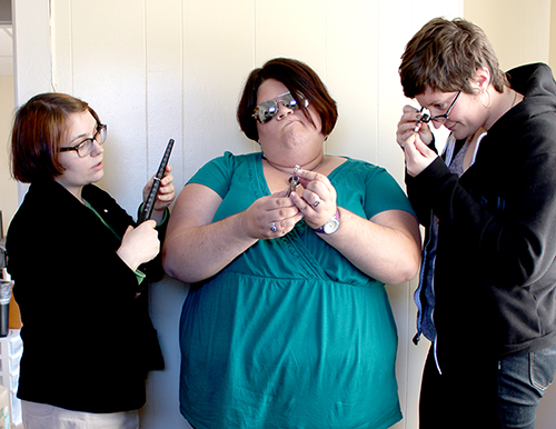 Aubin, Alicia, and Emily examine some of Turtle Love Co.'s vintage engagement rings Aubin, Alicia, and Emily examine some of Turtle Love Co.'s vintage engagement rings
